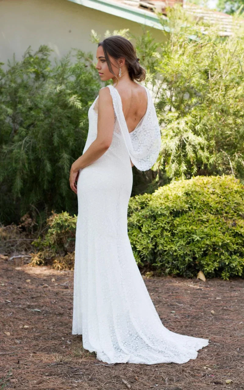 Vestido de novia estilo bohemio con encaje de sirena y espalda baja